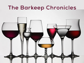multiple shapes of glasses of alcohol in a line