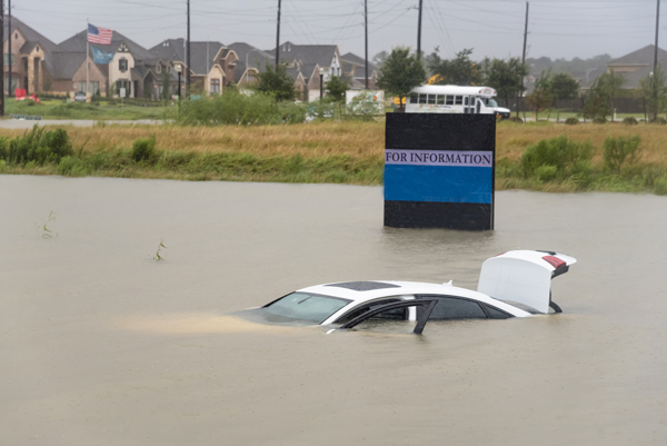 Insurance Post Hurricane Harvey, a program with The Luxury Marketing Council of San Francisco Insurance Post Harvey flooded sedan